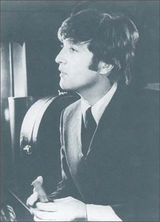 John Lennon in A Hard Day's Night: John is in the baggage car where the playing and singing of I Should Have Known Better takes place.