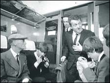 The Beatles in A Hard Day's Night: John Lennon and George Harrison during a scene on the train from A Hard Day's Night.